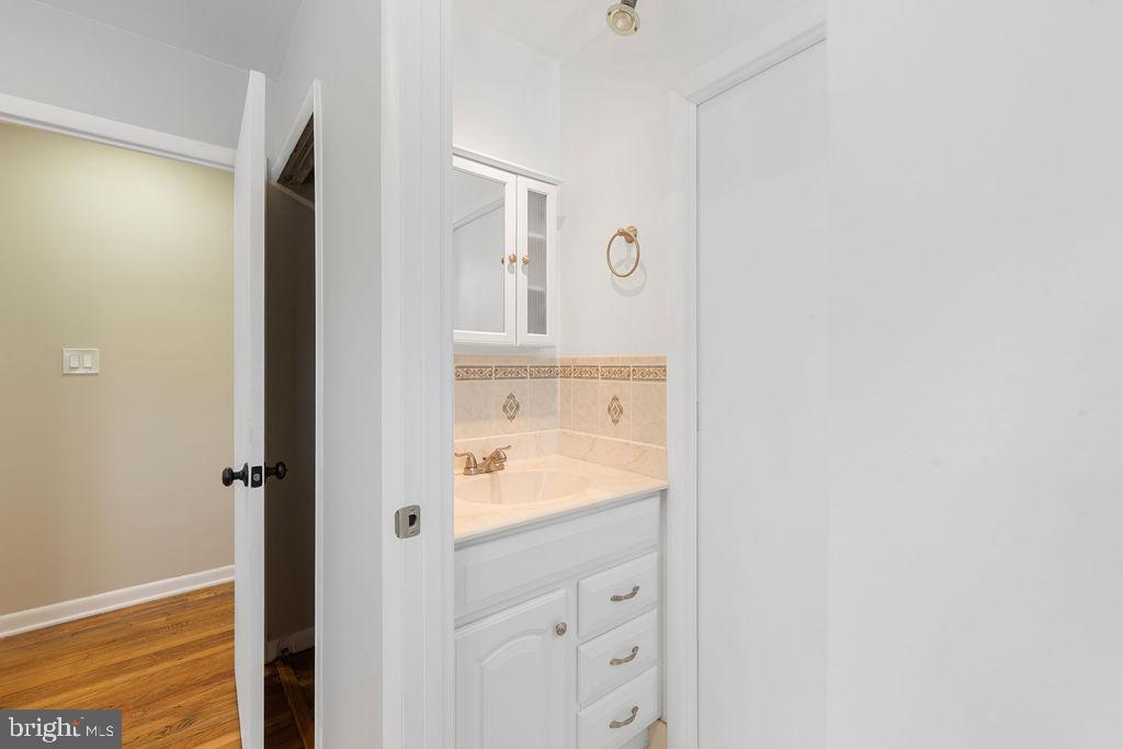 8003 Allentown Road Fort Washington, MD 20744 - Photo 22 of 43 a bathroom with a shower and a sink
