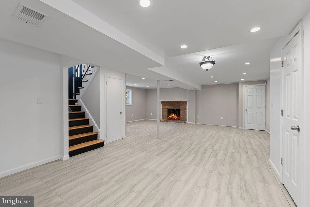 8003 Allentown Road Fort Washington, MD 20744 - Photo 33 of 43 a view of kitchen and hall with wooden floor