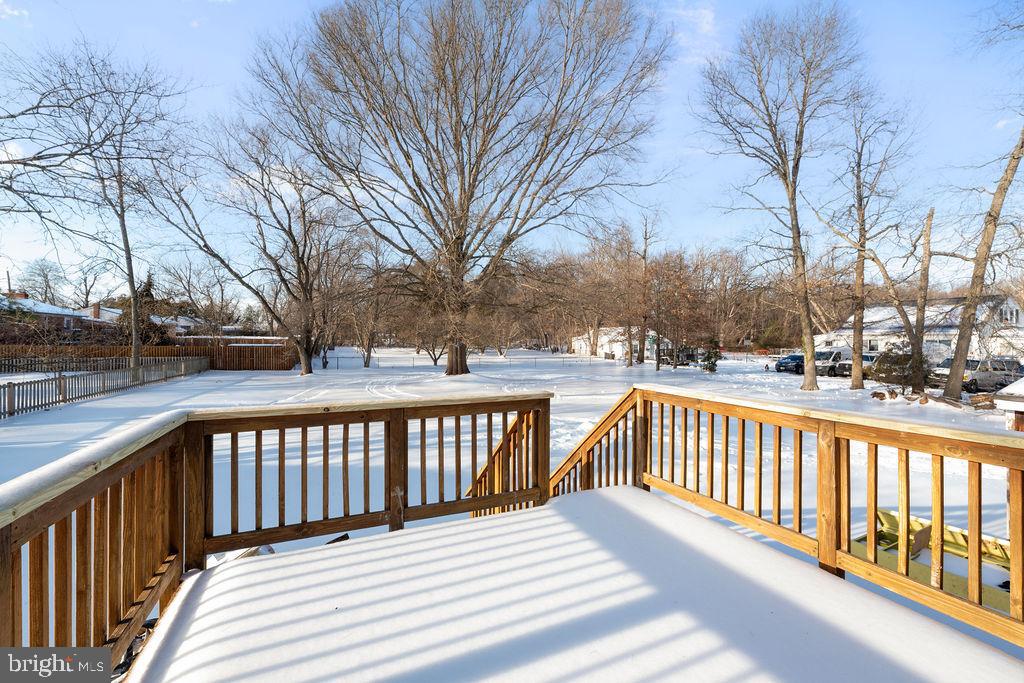 8003 Allentown Road Fort Washington, MD 20744 - Photo 38 of 43 a view of a wooden deck with a yard