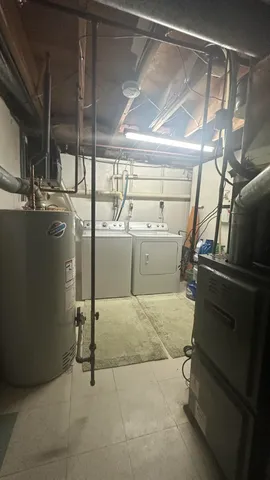 a storage room with washer and dryer