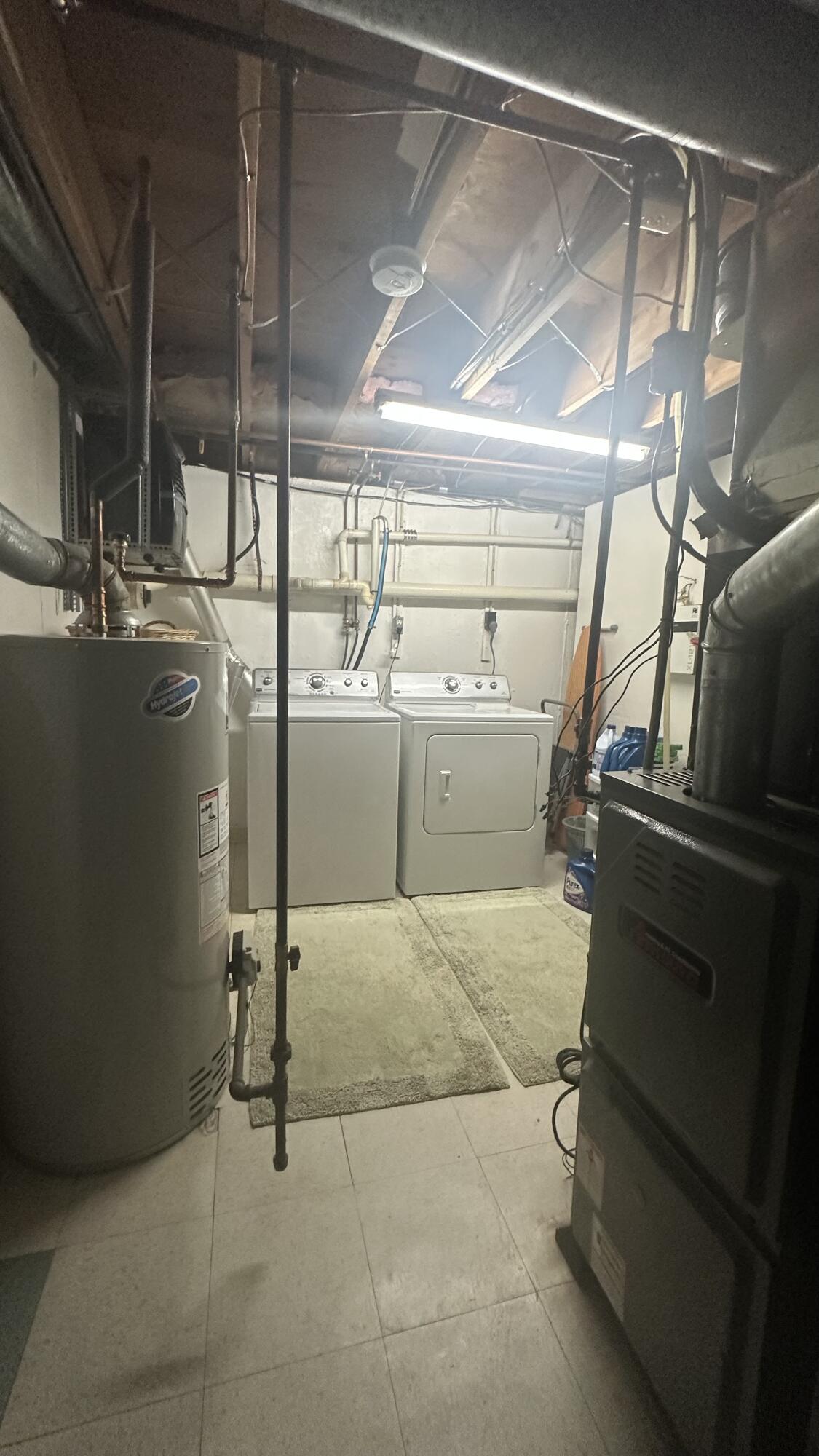 300 Buck Island Road, Unit 14F West Yarmouth, MA 02673 - Photo 20 of 27 a storage room with washer and dryer