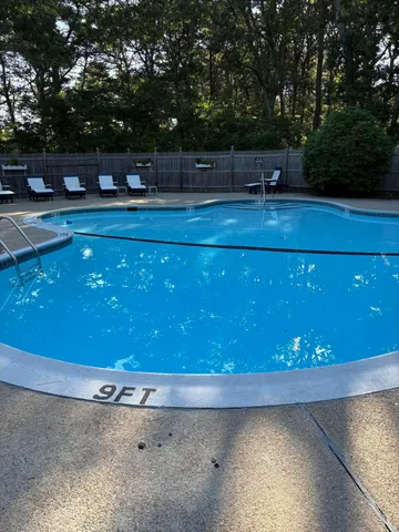 a room with a lots of furniture and clutter