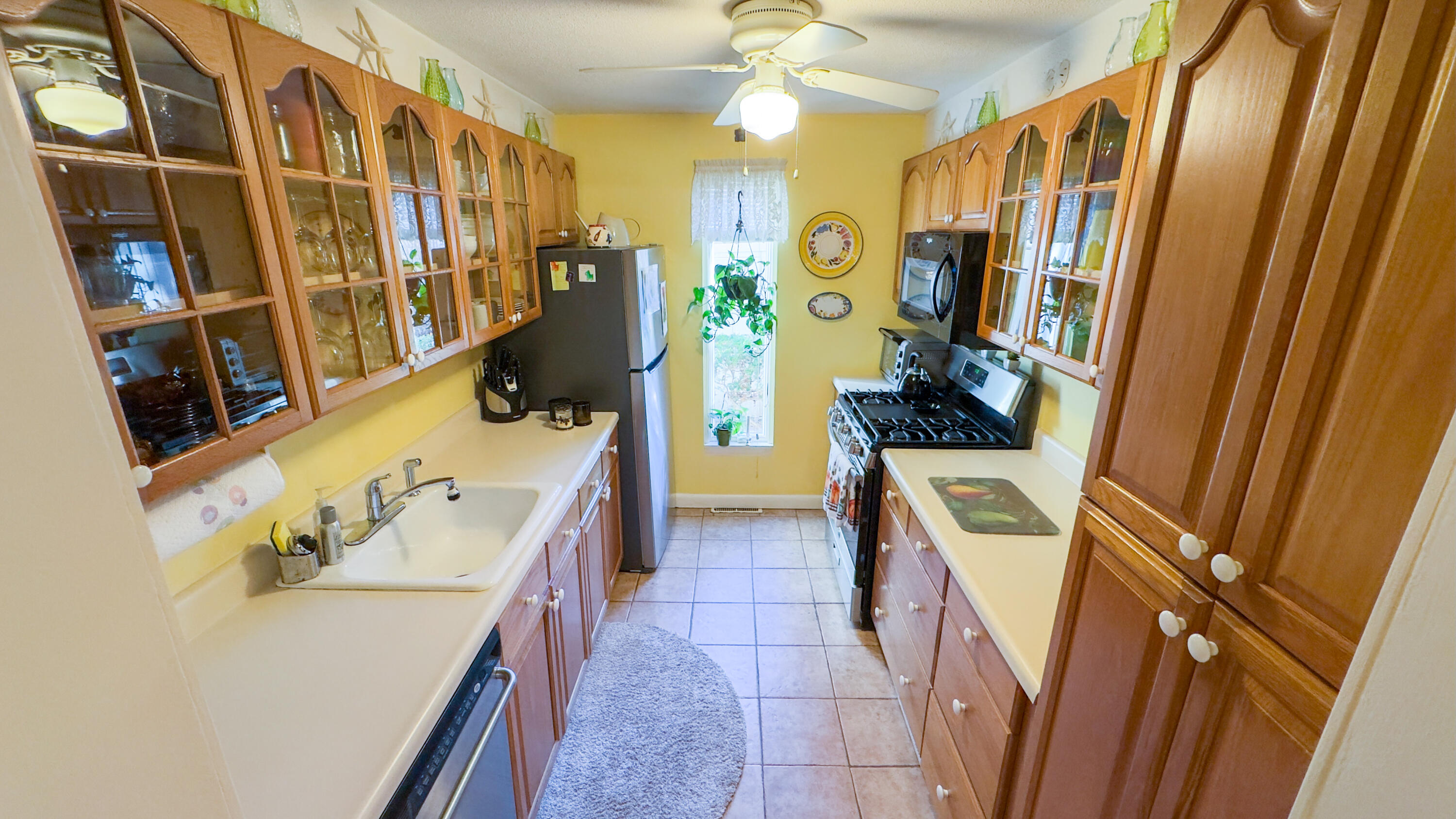 300 Buck Island Road, Unit 14F West Yarmouth, MA 02673 - Photo 5 of 27 a bathroom with a sink a vanity and a mirror