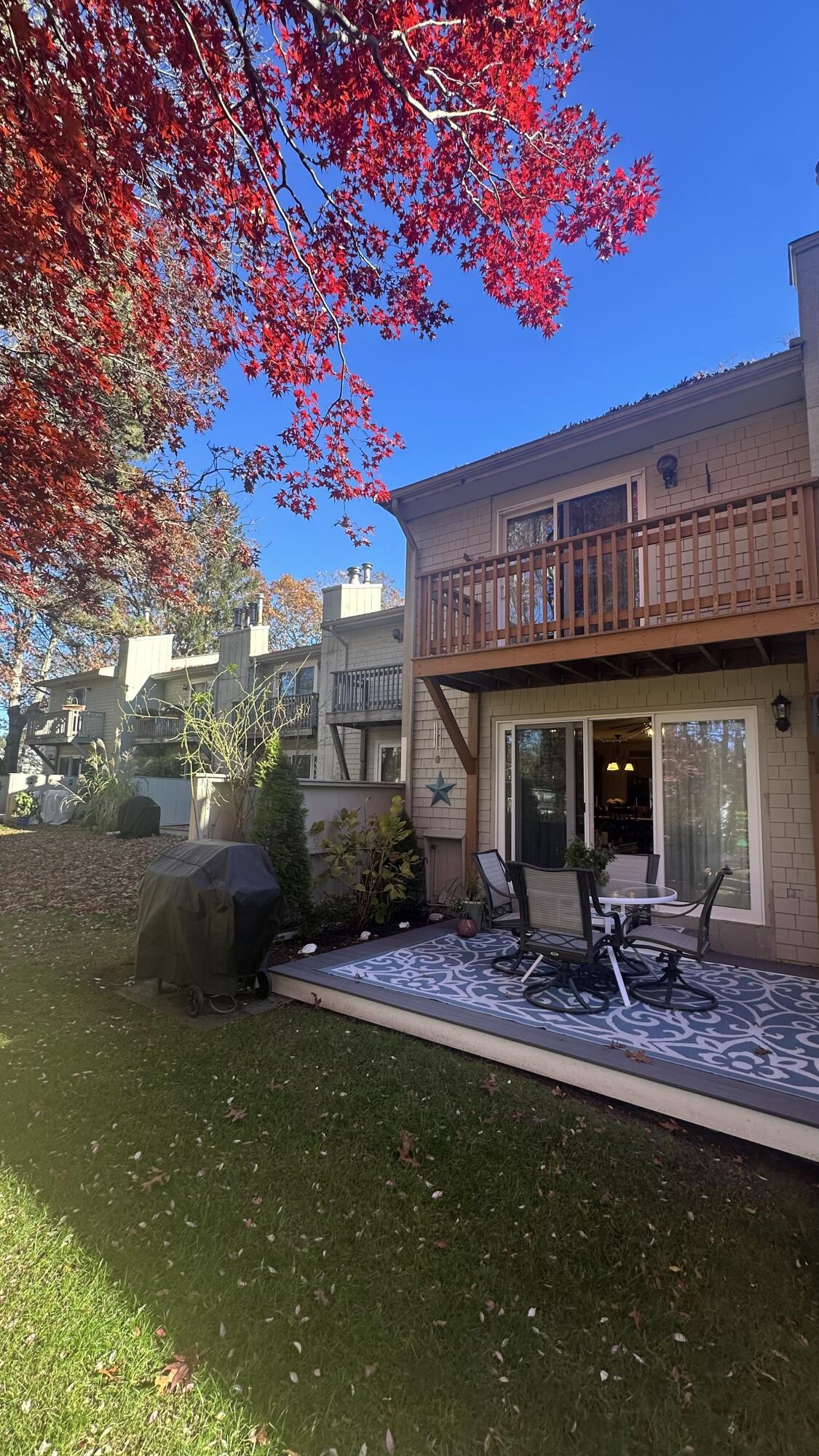 300 Buck Island Road, Unit 14F West Yarmouth, MA 02673 - Photo 7 of 27 a view of a chairs and table in the patio
