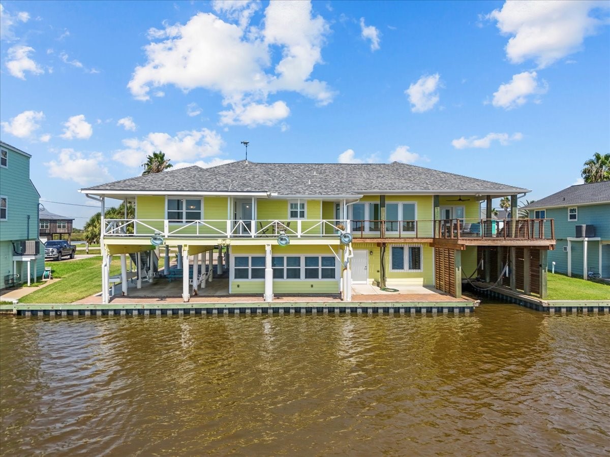 6 Trout Lane Freeport, TX 77541 - Photo 1 of 40 a view of a building with swimming pool and sitting space