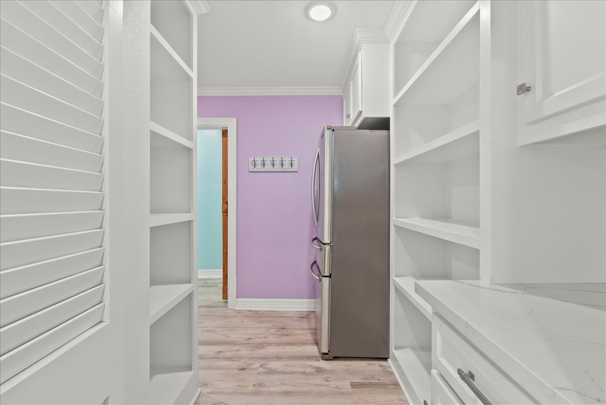 6 Trout Lane Freeport, TX 77541 - Photo 12 of 40 a bathroom with a shower and a sink