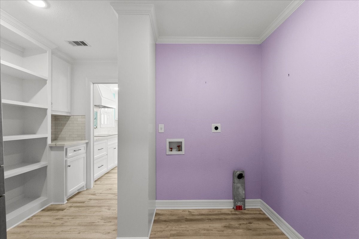 6 Trout Lane Freeport, TX 77541 - Photo 13 of 40 a view of walk in closet with empty racks