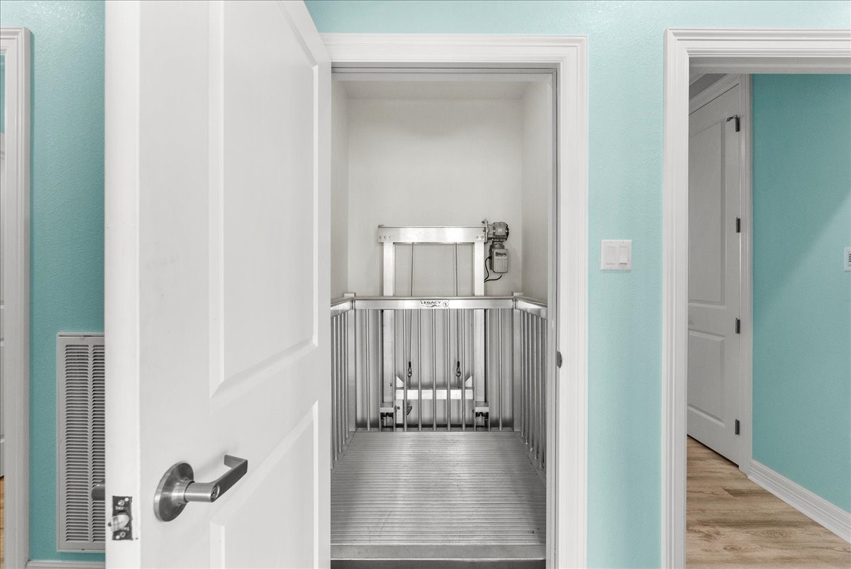 6 Trout Lane Freeport, TX 77541 - Photo 19 of 40 a view of a hallway with a livingroom and a white door