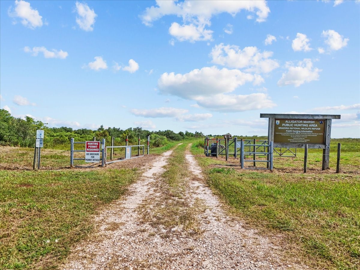 6 Trout Lane Freeport, TX 77541 - Photo 36 of 40 a view of a lake with a big yard