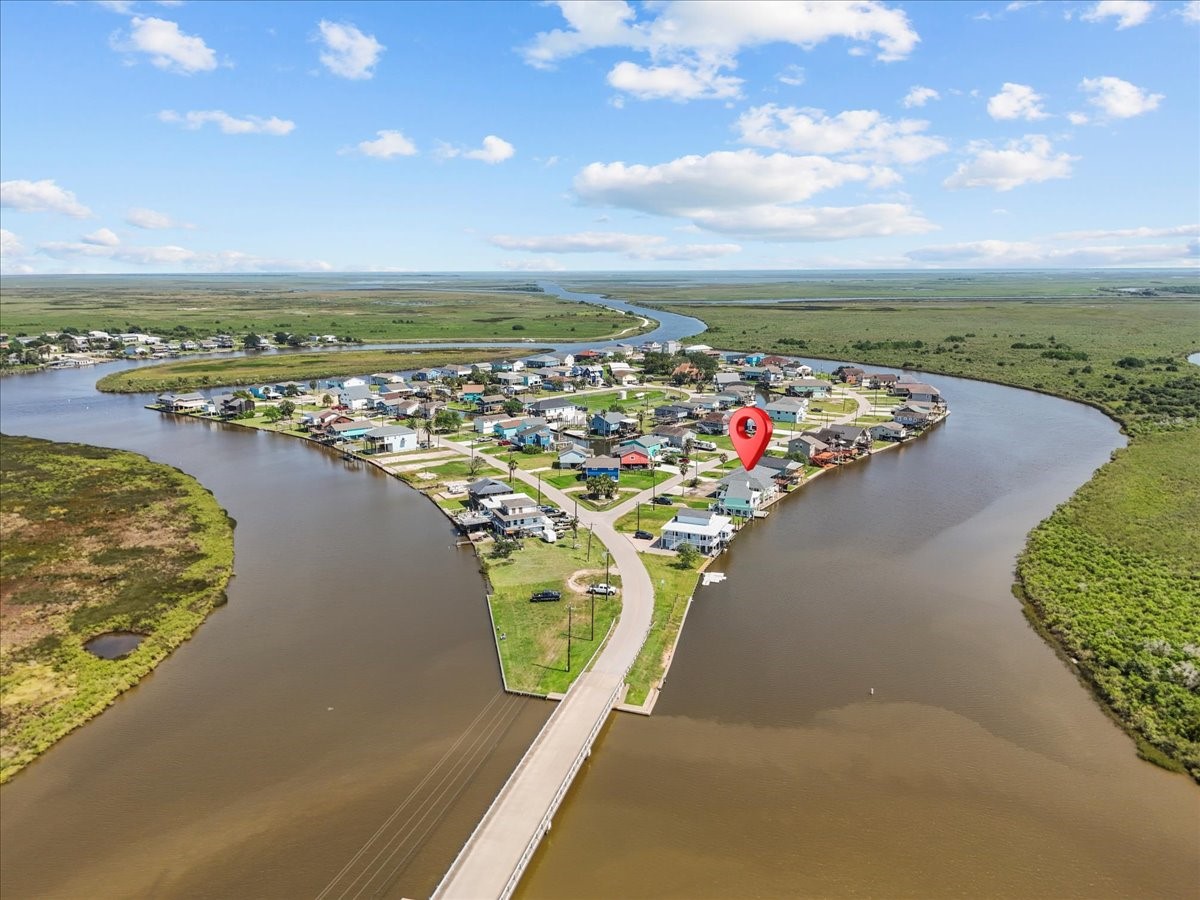 6 Trout Lane Freeport, TX 77541 - Photo 5 of 40 a view of a lake with a mountain