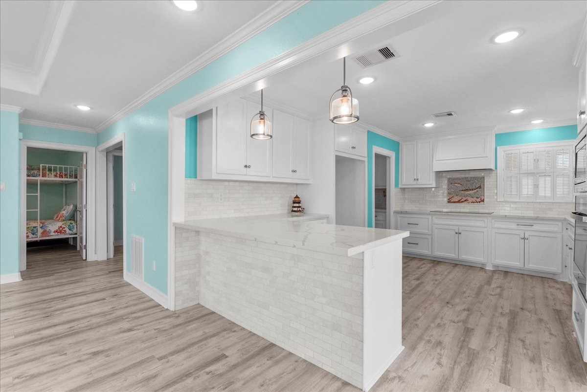 6 Trout Lane Freeport, TX 77541 - Photo 7 of 40 a view of kitchen with wooden floor and electronic appliances