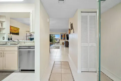 a bathroom with a sink a mirror and shower