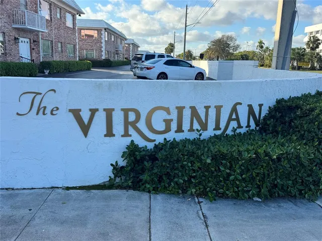 a street sign on a pole on a street