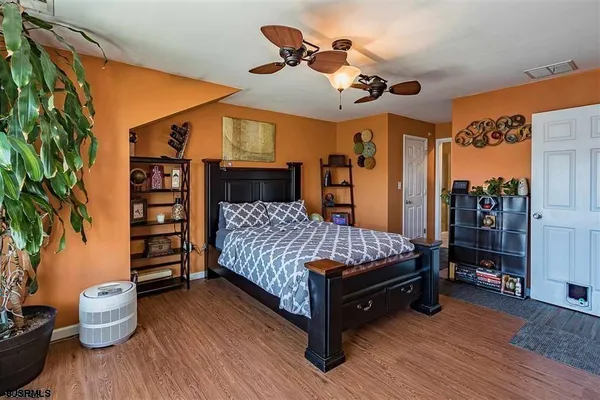 a bed room with a bed and a couch