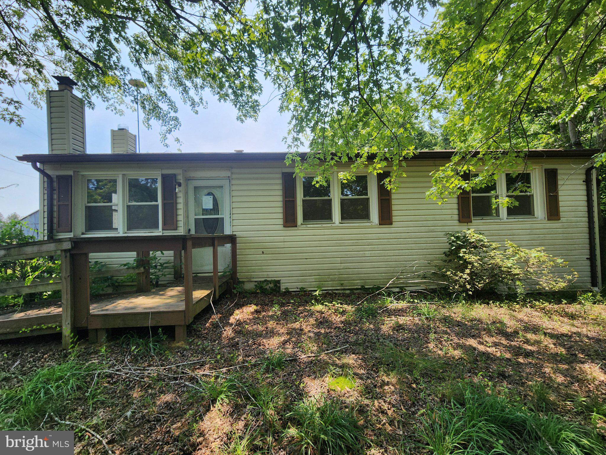 5970 Scaggs Road Owings, MD 20736 - Photo 1 of 23 Charming home nestled in nature's embrace.