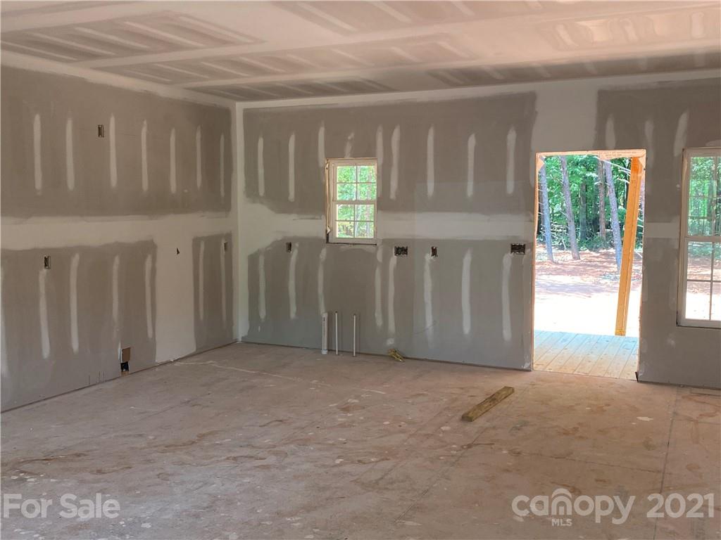 1063 Rhyne Road Clover, SC 29710 - Photo 3 of 9 a view of an empty room with windows