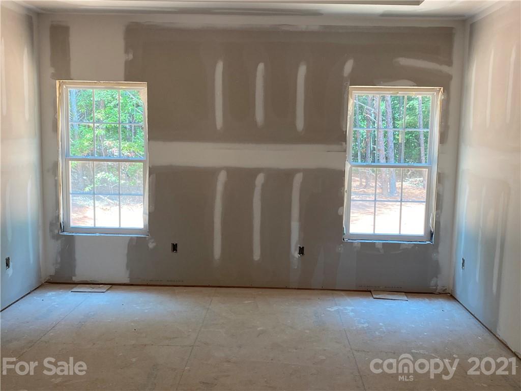 1063 Rhyne Road Clover, SC 29710 - Photo 4 of 9 an empty room with windows