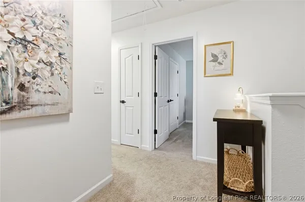 a bedroom with a bed and a desk