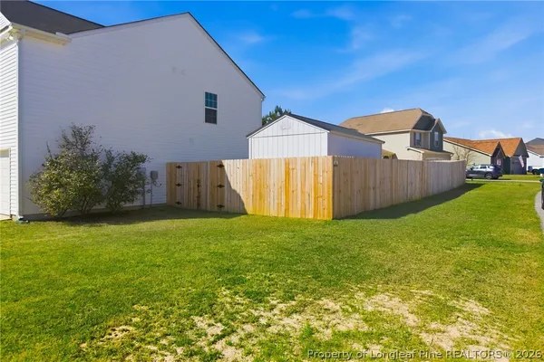 a front view of house with yard