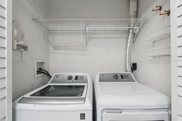 a utility room with dryer and washer