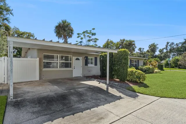 a house view with a garden space