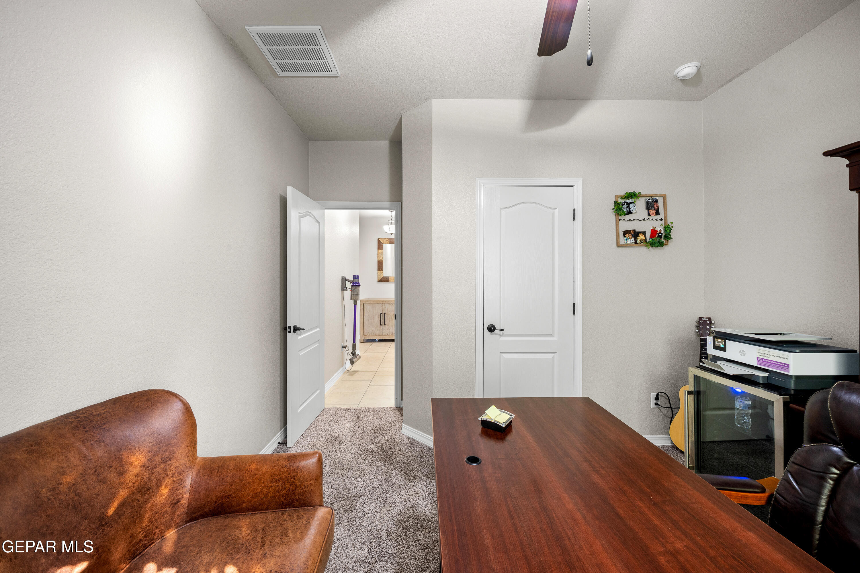 7755 Enchanted Path Drive El Paso, TX 79911 - Photo 26 of 34 a bedroom with furniture and a wooden floor
