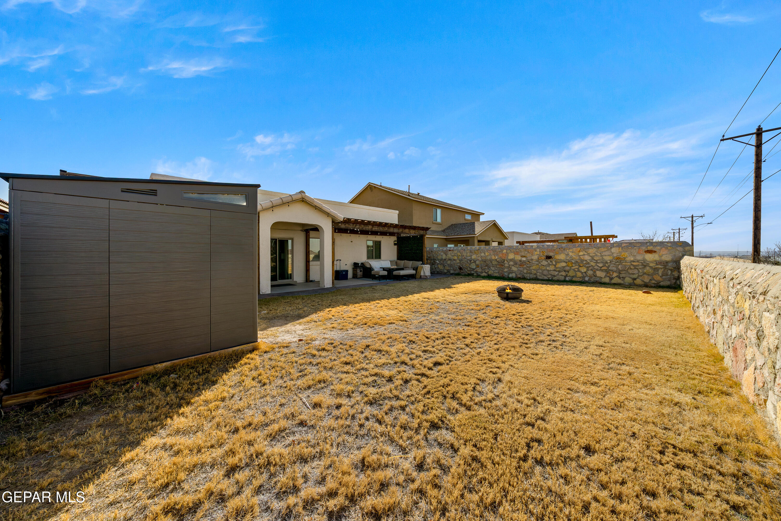 7755 Enchanted Path Drive El Paso, TX 79911 - Photo 32 of 34 a view of a house with a yard