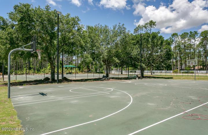 2133 West Quay Road St. Augustine, FL 32092 - Photo 7 of 12 a view of a playground with basketball court