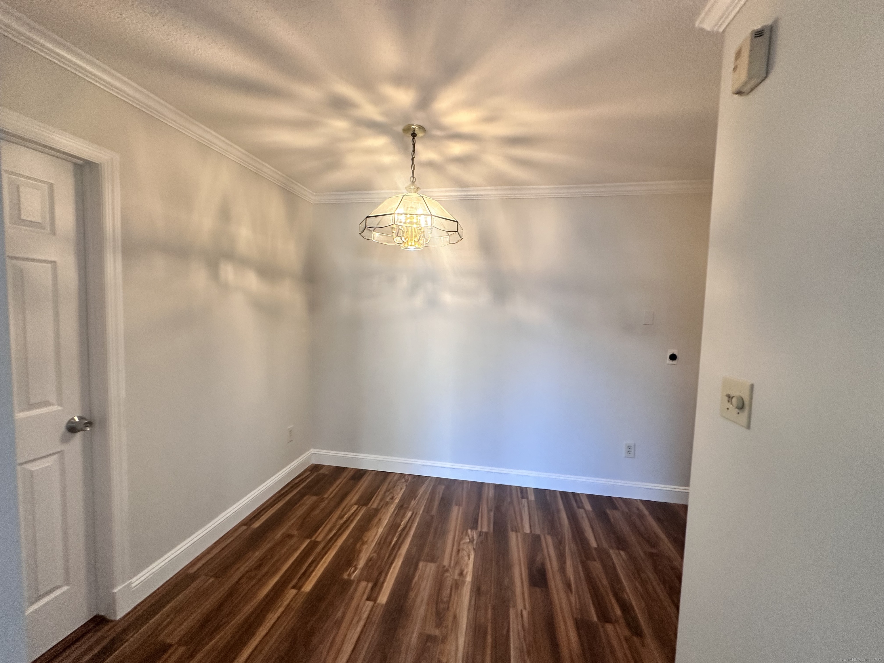150 Main Street, Unit B6 Norwalk, CT 06851 - Photo 6 of 15 a view of a room with racks on the wall