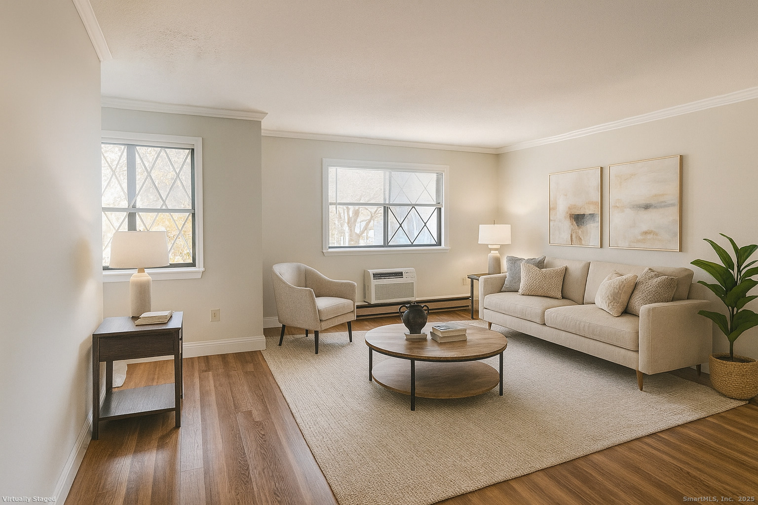 150 Main Street, Unit B6 Norwalk, CT 06851 - Photo 9 of 15 a living room with furniture a rug and a window