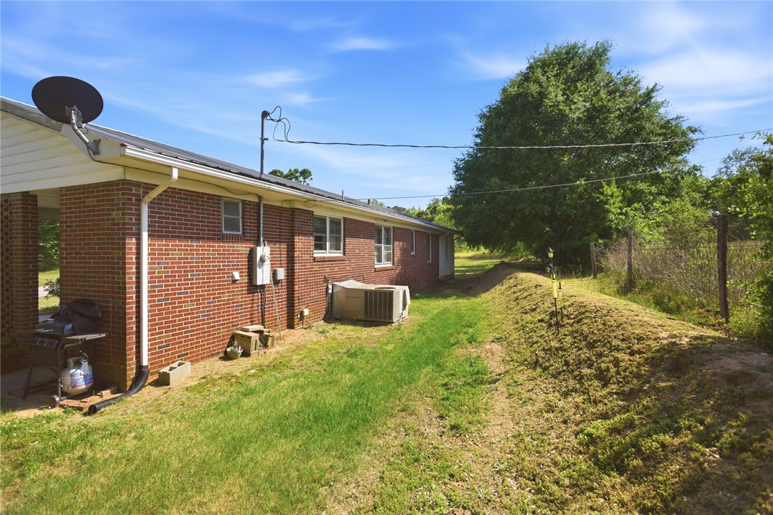 282 West Bennett Road Westminster, SC 29693 - Photo 37 of 42 This brick residence offers a private backyard, ideal for quiet enjoyment and outdoor activities.
