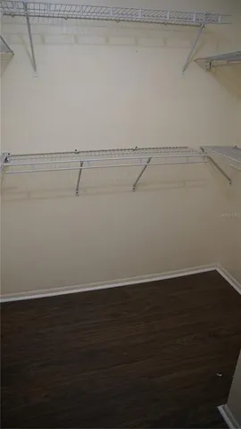 a view of a room with racks on the wall