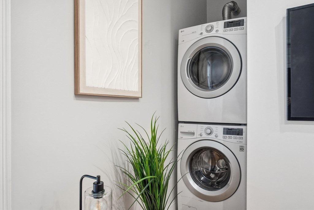 80 Marion Street, Unit 2 Boston, MA 02128 - Photo 11 of 33 a utility room with dryer and washer