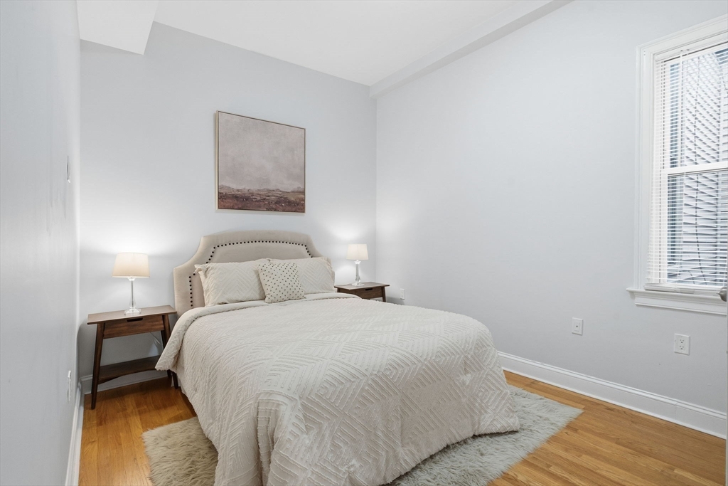 80 Marion Street, Unit 2 Boston, MA 02128 - Photo 22 of 33 a bedroom with a bed and a window
