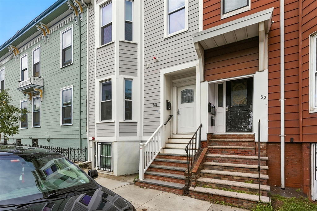 80 Marion Street, Unit 2 Boston, MA 02128 - Photo 30 of 33 a front view of a house with stairs