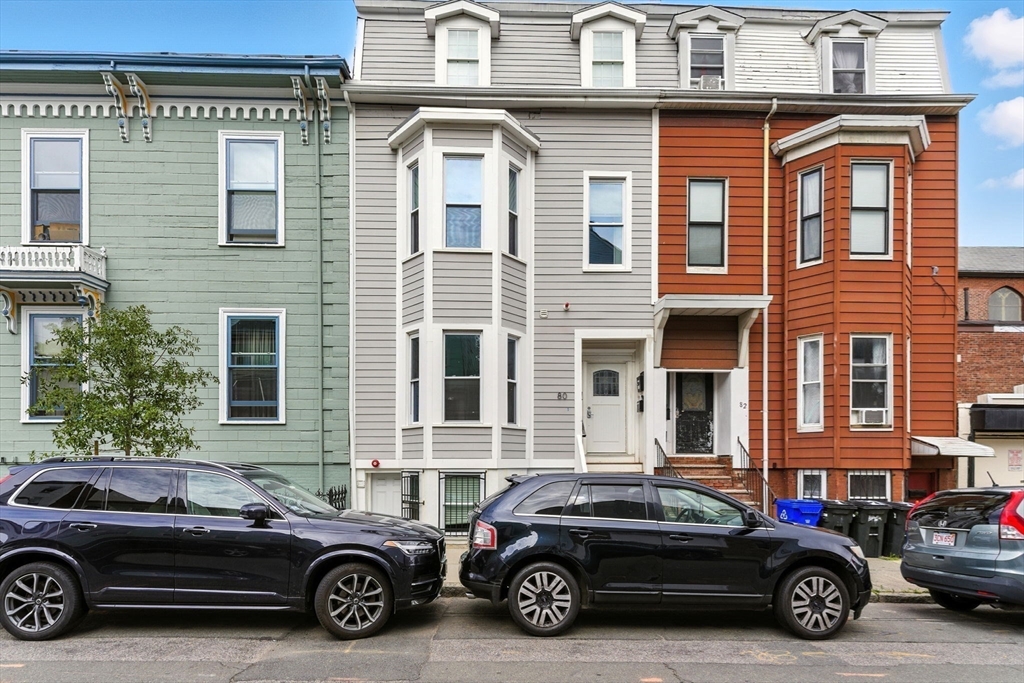 80 Marion Street, Unit 2 Boston, MA 02128 - Photo 31 of 33 a car parked in front of a building