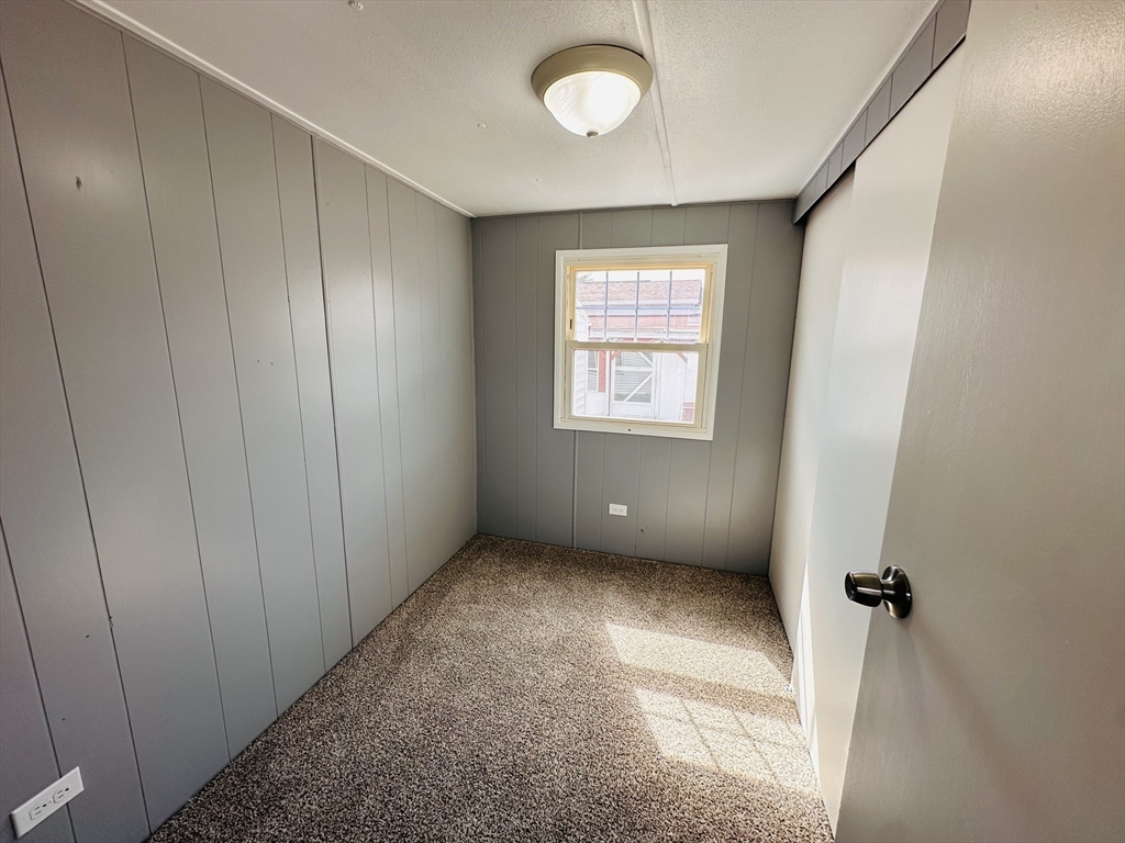 70 Shumway Street, Unit A3 Springfield, MA 01119 - Photo 14 of 28 a view of an empty room with a window