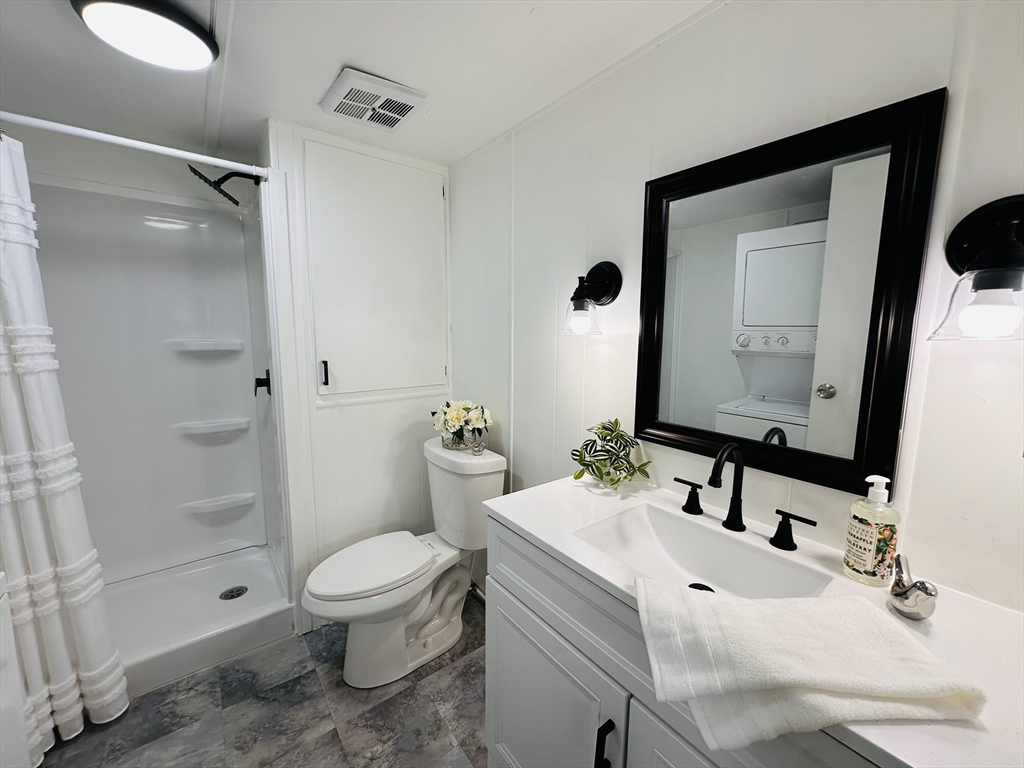 70 Shumway Street, Unit A3 Springfield, MA 01119 - Photo 15 of 28 a bathroom with a sink toilet and shower