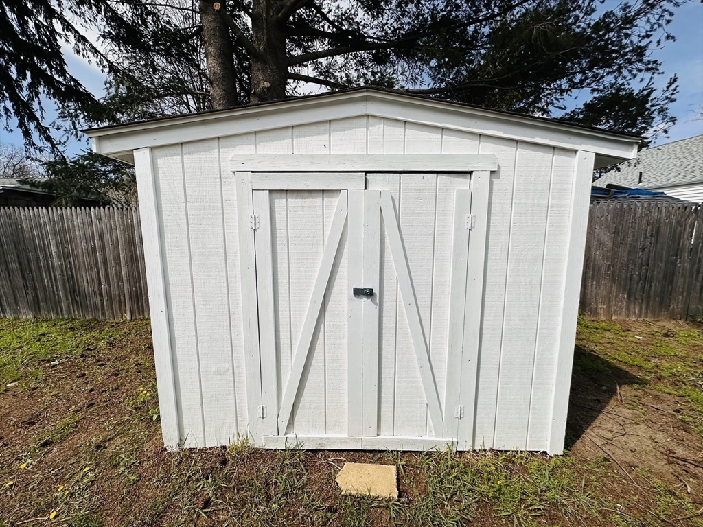 70 Shumway Street, Unit A3 Springfield, MA 01119 - Photo 26 of 28 a white house with a outdoor space