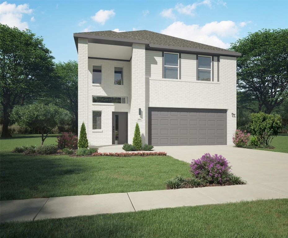 274 Bendecido Loop Elgin, TX 78621 - Photo 1 of 1 View of front facade with driveway, a front yard, an attached garage, and brick siding