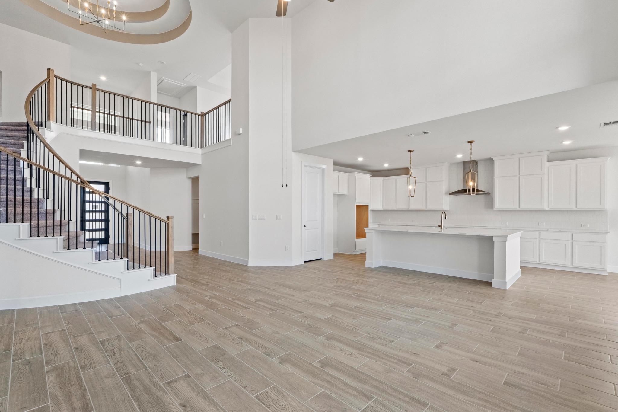 604 Lightstone Drive Georgetown, TX 78633 - Photo 2 of 39 a view of a kitchen and an empty room