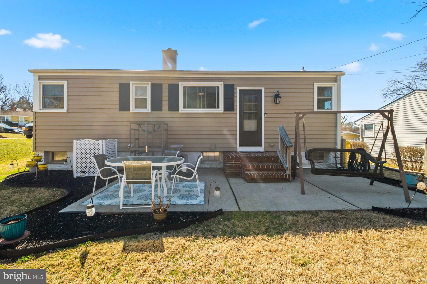 206 Cheddington Road Linthicum Heights, MD 21090 - Photo 27 of 27 a view of a house with backyard and sitting area