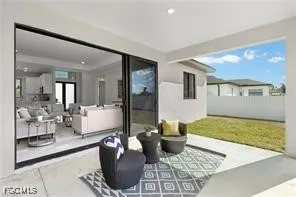 a living room with furniture and a rug