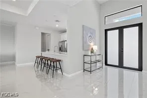a view of livingroom with furniture and window