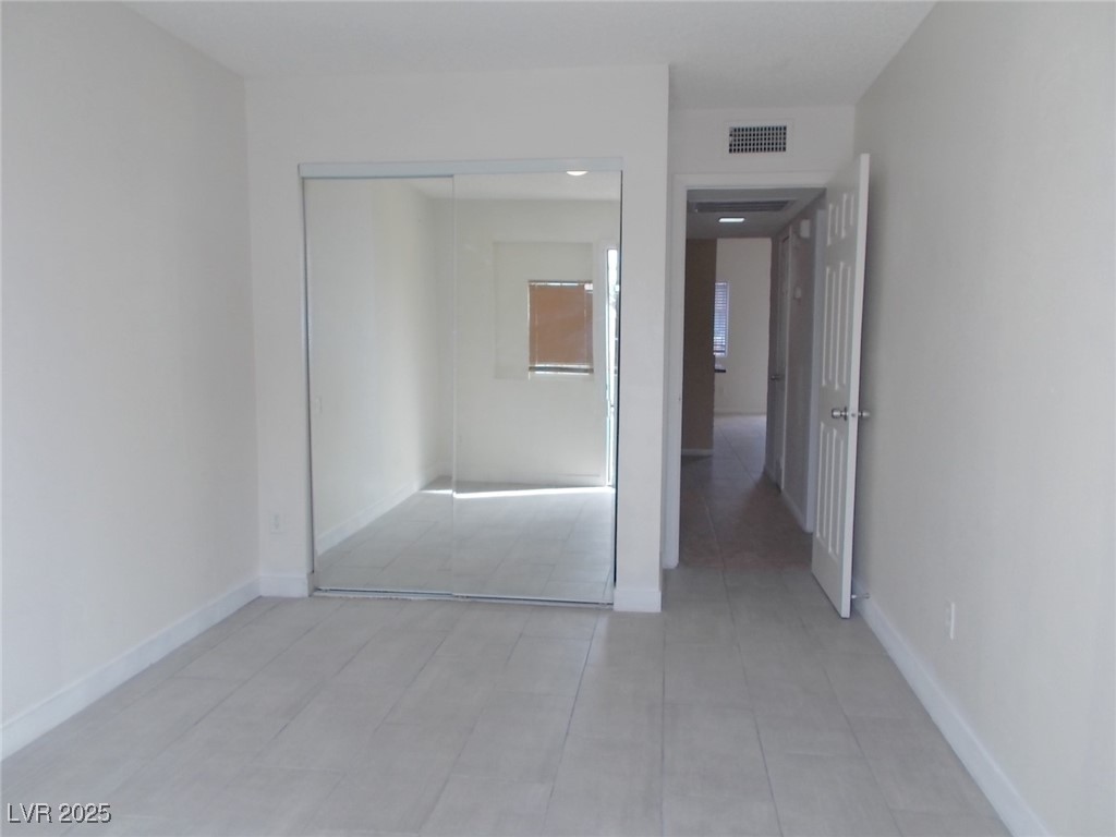 4521 Halbert Avenue Las Vegas, NV 89110 - Photo 10 of 16 Unfurnished bedroom with visible vents, baseboards