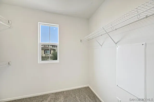 a view of a room with rack on the wall