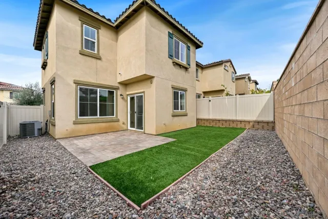 a view of a back yard of the house