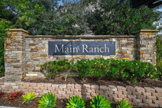 a signage on a brick wall