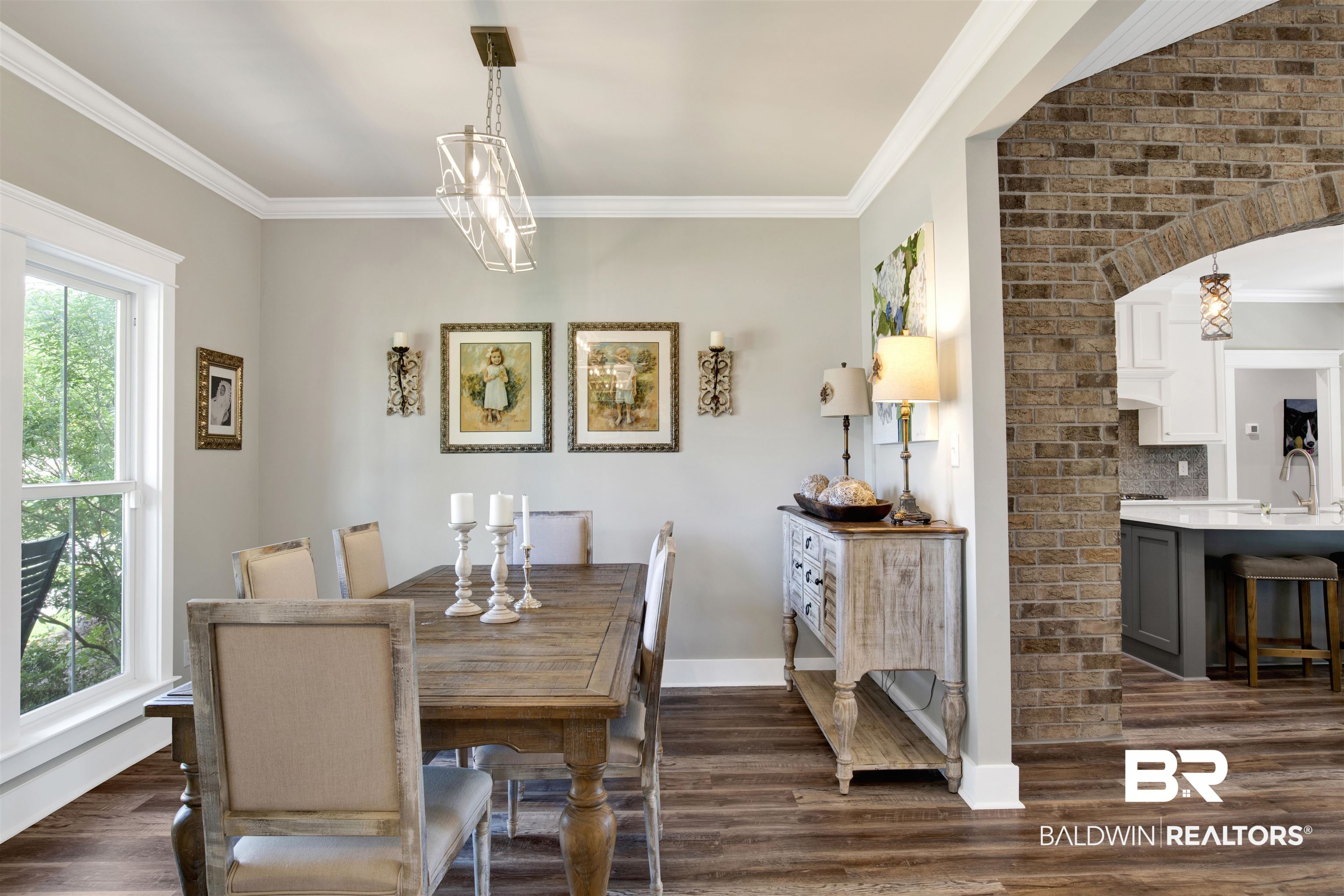 21621 Veranda Boulevard Fairhope, AL 36532 - Photo 29 of 51 Dining room featuring dark wood-type flooring, ornamental molding, and baseboards