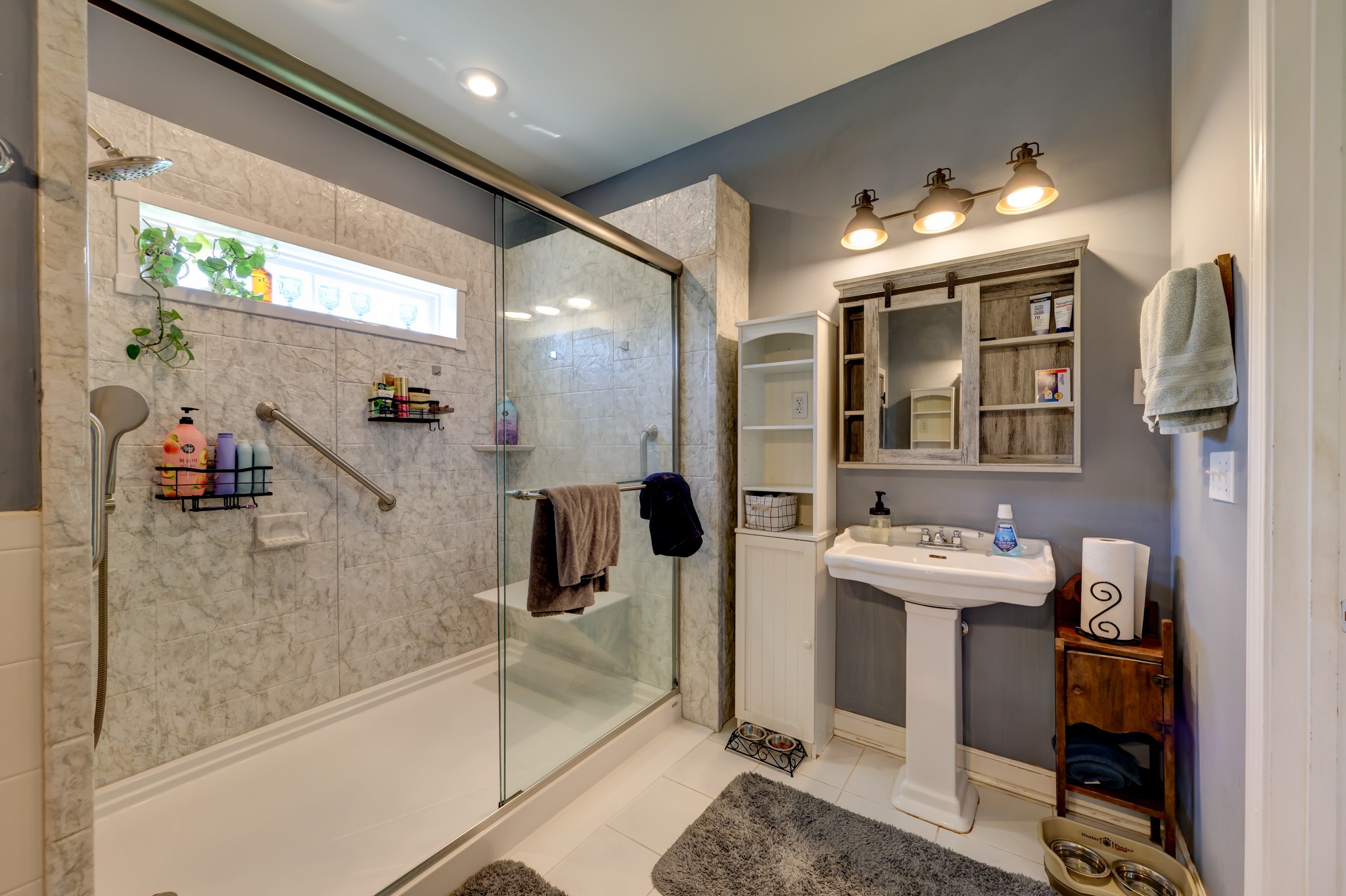 2251 Davidson Graveyard Road Clarksville, TN 37043 - Photo 60 of 78 a bathroom with a sink and mirror